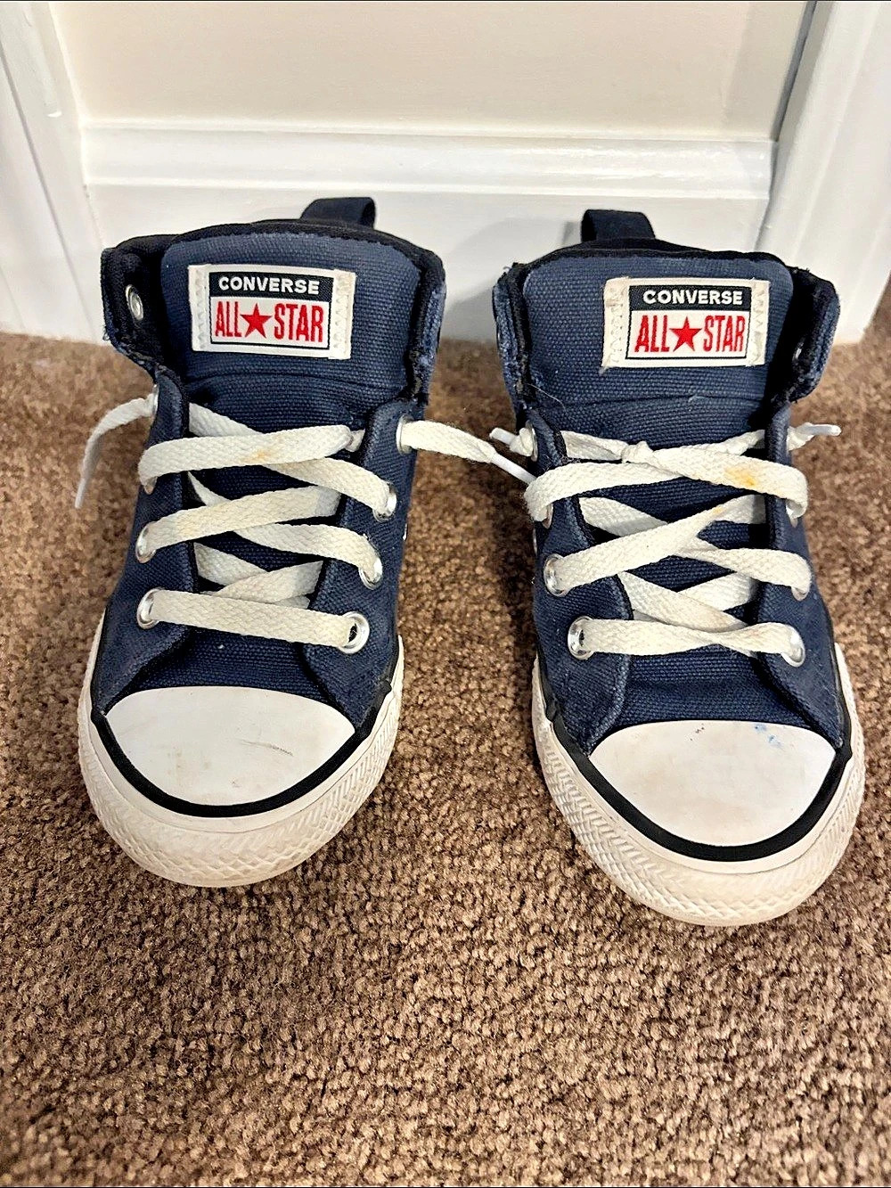Navy Converse Chuck Taylor All Star sneakers